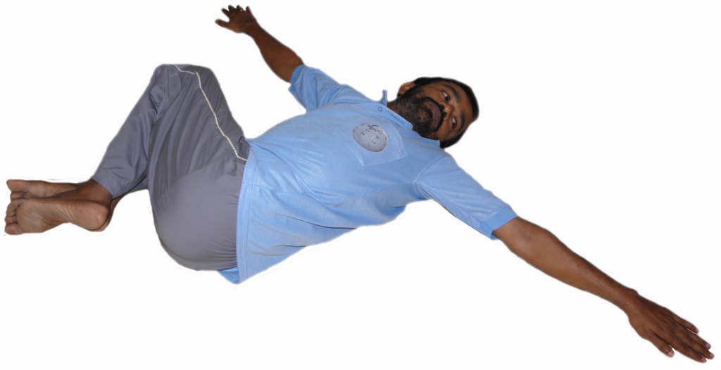 Jathara Parivartanasana (Revolved Abdomen Pose)